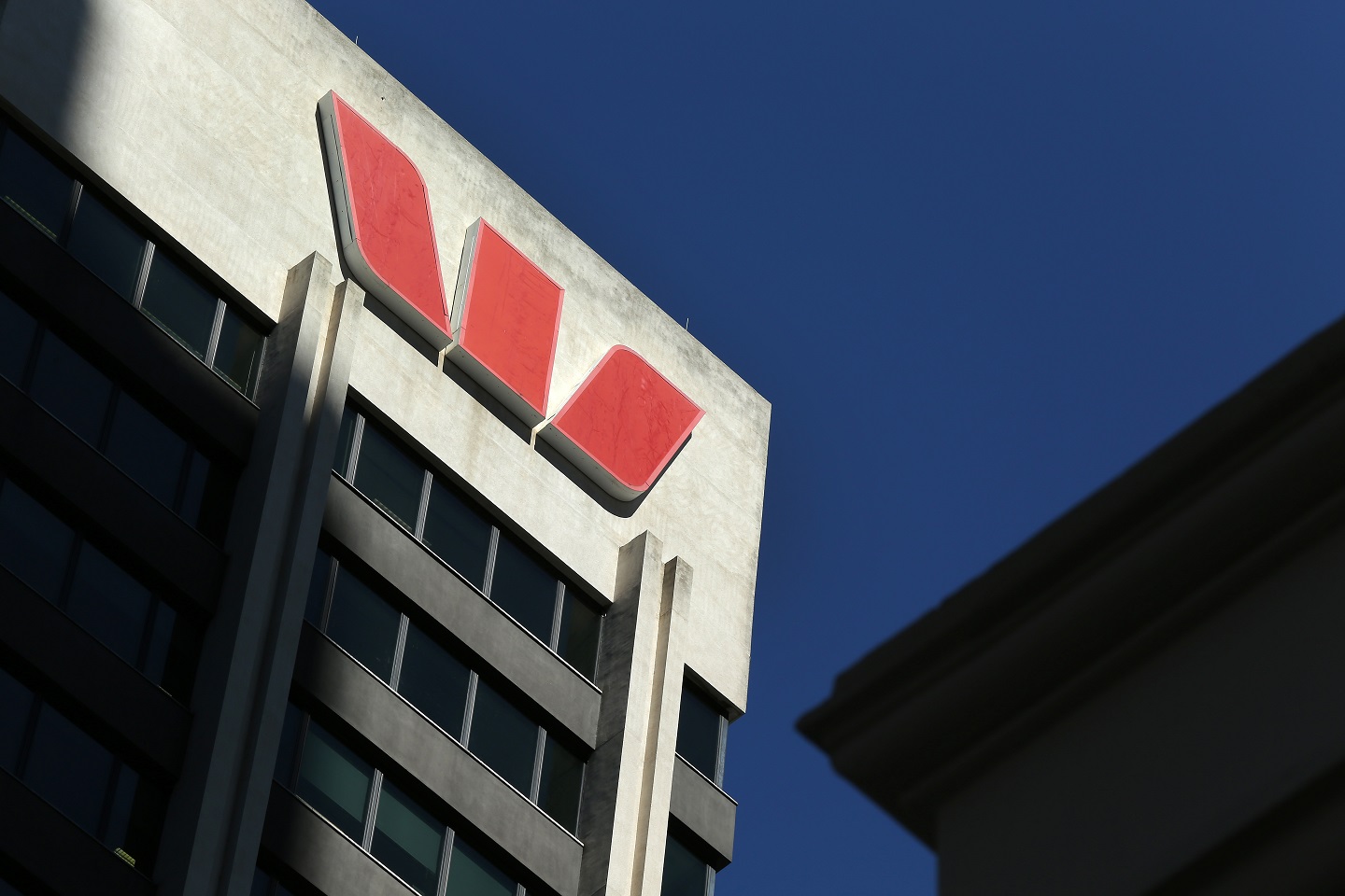 Westpac H1 profit falls 22%