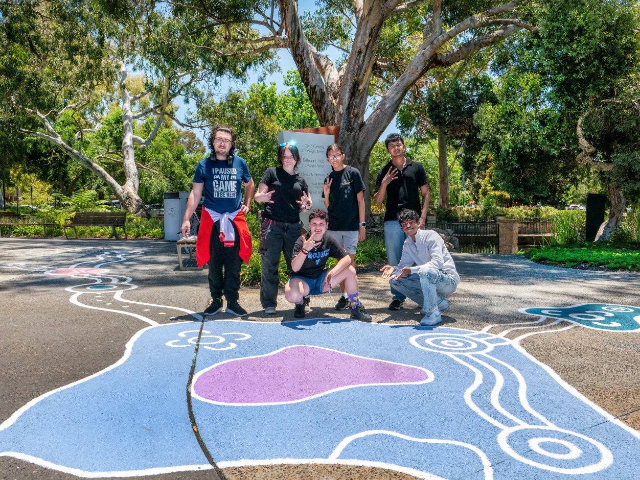 Youth working on the murals,bollards and planted greenery, transforming Wright Street into a coherent visual narrative reflecting local identity and connection.