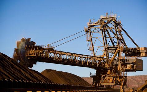 Big boys pile pressure on smaller iron ore players