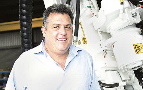 Swick lays off staff, flags impairments