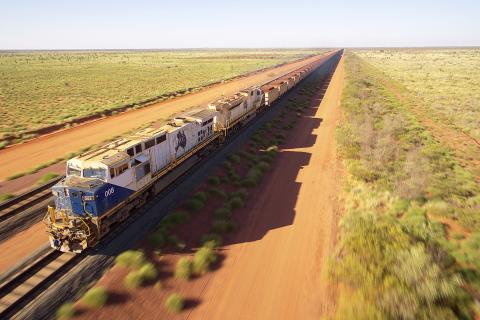 Fortescue cuts dividend as profit slumps