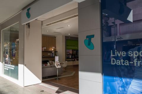 Telstra at three-month high despite profit drop