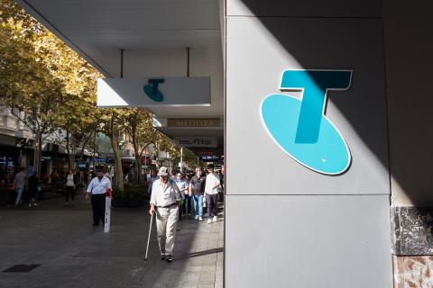 Telstra flags $500m FY cost hit