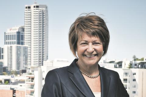 Macmahon brings back former director