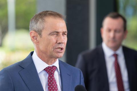 WA in no rush to bring down hard borders