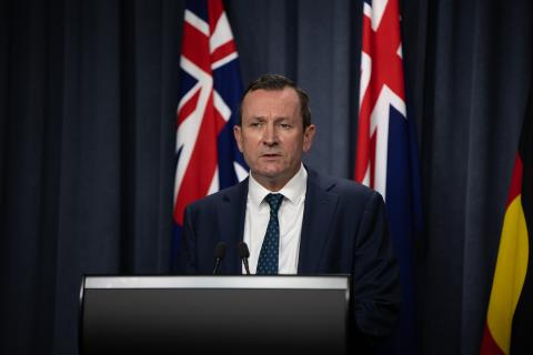 COVID cases climb by 1,179, McGowan defends new rules