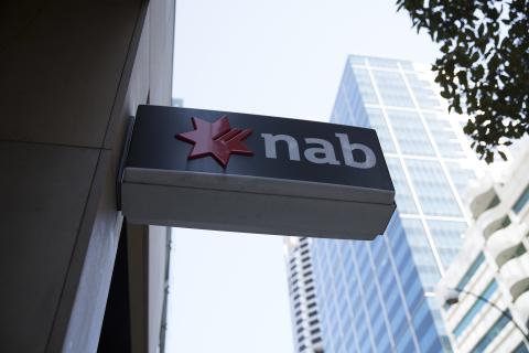NAB lifts first-half profit, dividend