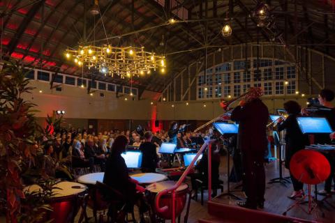 ARTS REVIEW: Orchestra busts barriers with smashing time