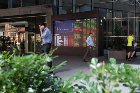 Australian stocks edge up to end mixed half year