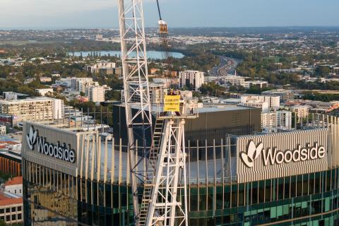 Climate activists scale 140-metre crane at Woodside HQ
