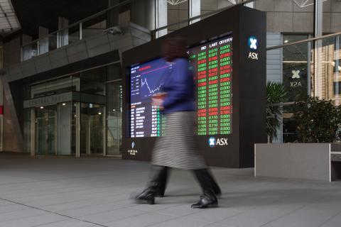 Australian shares slip as banks count cost, miners gain