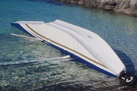 Part of a seaplane floating in the water near Rottnest