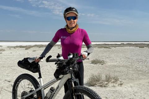 Kate Leeming amid the devastation of the Aral Sea on her Breaking the Cycle tour of Central Asia. Photo: Kate Leeming
