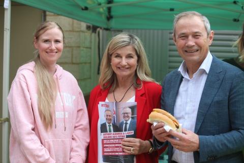 Trish Cook (middle) with Premier Roger Cook (right) on polling day. Photo: Sam Jones.