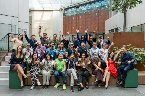 The founders in the 2025 accelerator program join members of the Plus Eight team, including leader Marcus Tan (far right).