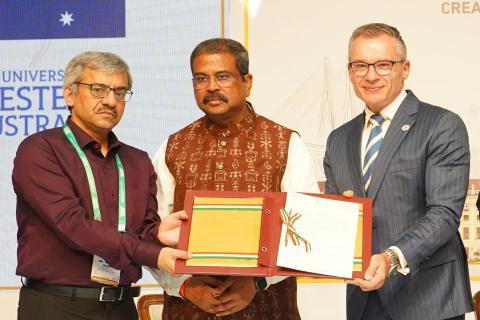 L-R: University Grants Commission acting chair Vineet Joshi, India’s Union Minister of Education Dharmendra Pradhan and UWA deputy vice-chancellor Guy Littlefair.