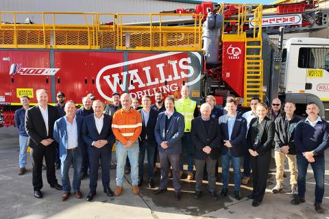 WA Premier Roger Cook and BHP WAIO asset president Tim Day with ministers and Wallis Drilling staff.