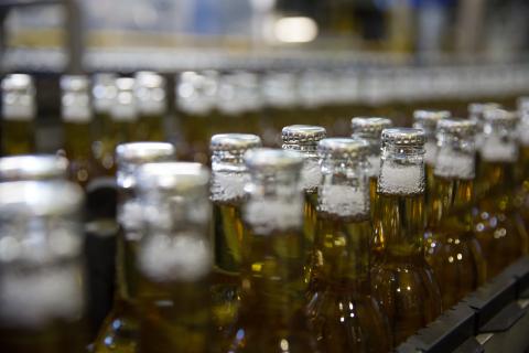 About 40 per cent of the cost of bottled beer is tax.