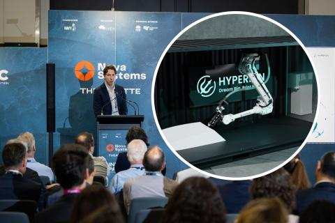 Joshua Wigley presents at the Indo Pacific International Maritime Exhibition. Photo supplied.