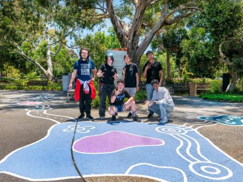 Youth working on the murals,bollards and planted greenery, transforming Wright Street into a coherent visual narrative reflecting local identity and connection.
