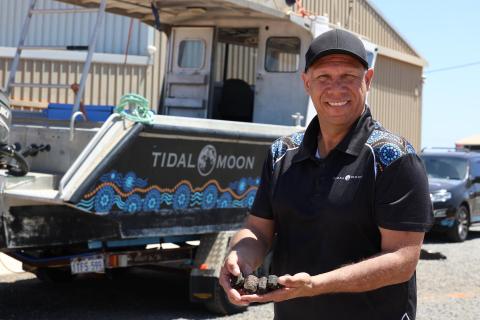 Michael Wear with dried sea cucumber harvested in Shark Bay. Photo: Tom Zaunmayr