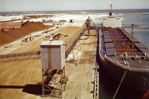 The Margarat Maru at Geraldton, being loaded with Australia’s first export shipment of iron ore in March 1966. Photo: State Library of WA