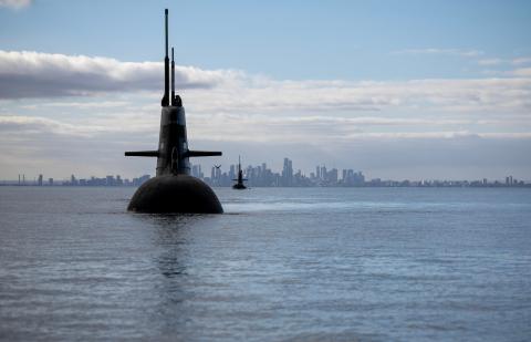 HMAS Dechaineux and HMAS Farncomb transit Port Phillip Bay after exercises on the east coast. Photo: LSIS James McDougall.