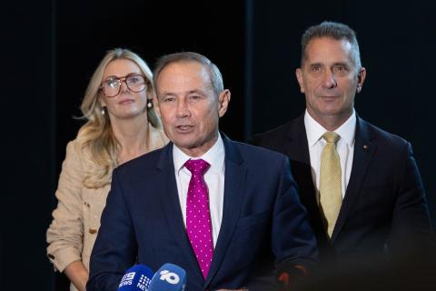 Roger Cook (middle) with Paul Papalia and Caitlin Collins to announce the defence forge. Photo: Michael O’Brien