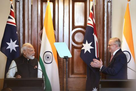 Narendra Modi and Anthony Albanese seal the deal last July. Photo: AAP/Hamish Blair