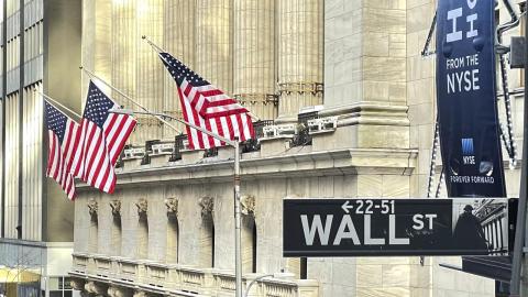 Late rally lifts stocks after Fed holds rates steady