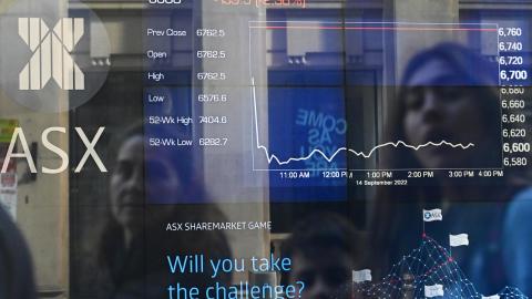 Indicator boards in the window of the ASX in Sydney