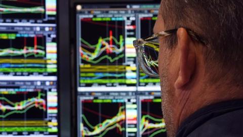 Wall Street inches higher