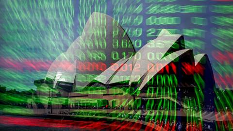 The Sydney Opera House and the indicator boards at the ASX