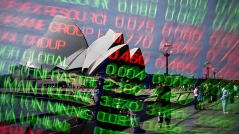 An ASX indicator board and the Opera House (file image)