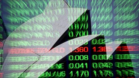 Indicator boards at the ASX turn green