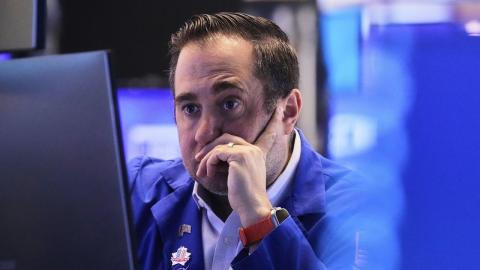 Wall St subdued by China trade uncertainty, Alphabet up