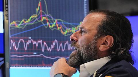 Wall St climbs Trump dials back EU tariff threats