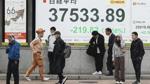 An electronic stock board showing Japan's Nikkei index
