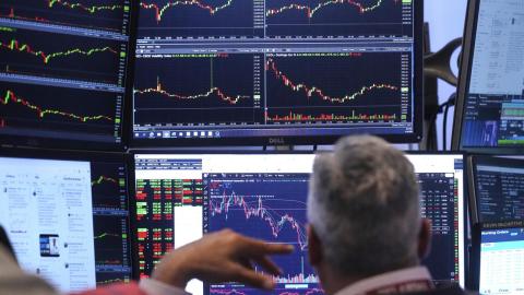 A trader works on the floor of the New York Stock Exchange