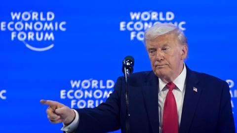 Wall St edges up as markets digest Trump's Davos speech