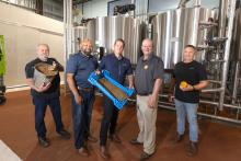 John Gibbs (left), Mick Little and Steve Jansen (far right) with Arvela’s Luke Wheat and C-Wise’s Greg Watts with samples at Spinifex Brewing