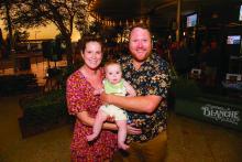 Lara Ducie, Bart Parsons, and their baby, Jaz, outside Blanche Bar.