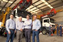 Kim Wallis (left) with his father, Graeme, brother Grant and Mark Crumby at the family-owned company’s Midvale workshop. Photo: Michael O’Brien