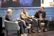 Aiden Morrison (centre) speaks alongside Chris Keefer (right) and panel moderator Tom Switzer this morning. Photo: Diggers & Dealers