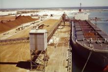 The Margarat Maru at Geraldton, being loaded with Australia’s first export shipment of iron ore in March 1966. Photo: State Library of WA